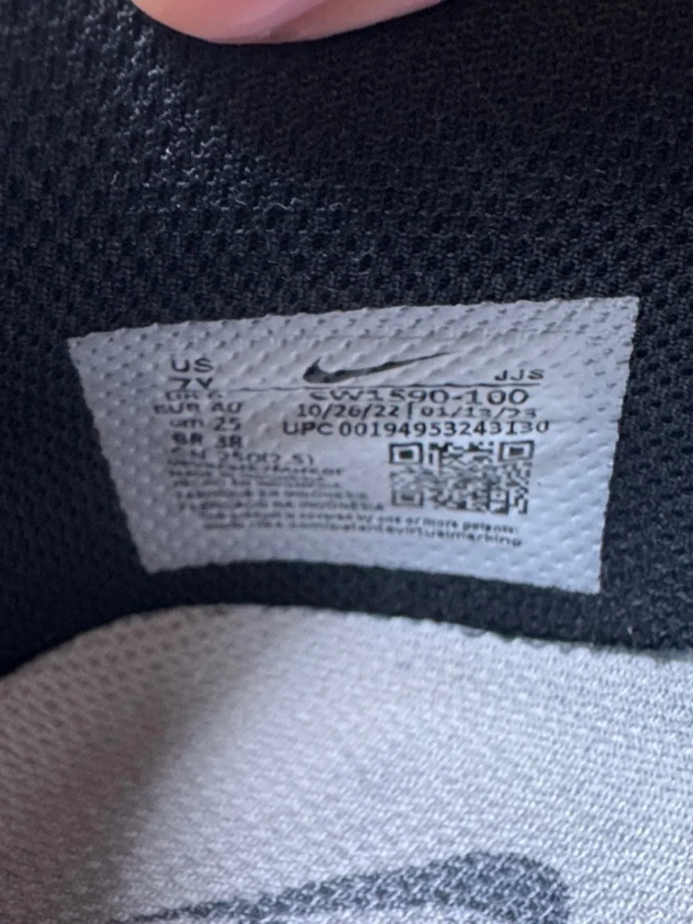Nike Black and White Low-Top Sneakers with Classic Swoosh